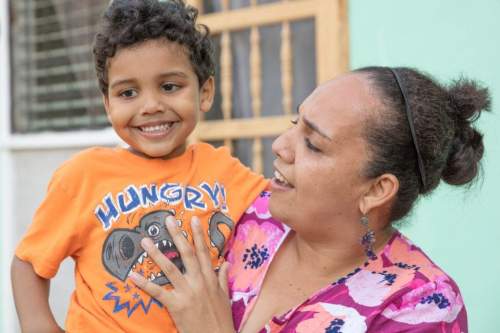 Smiling boy and his mom